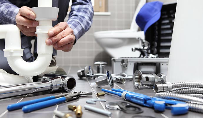 Bathroom plumbing installation work in progress