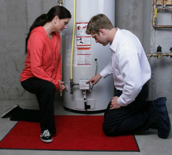 Persons inspecting water heater