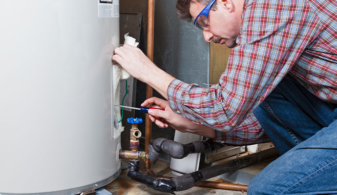 A professional repairing water heater