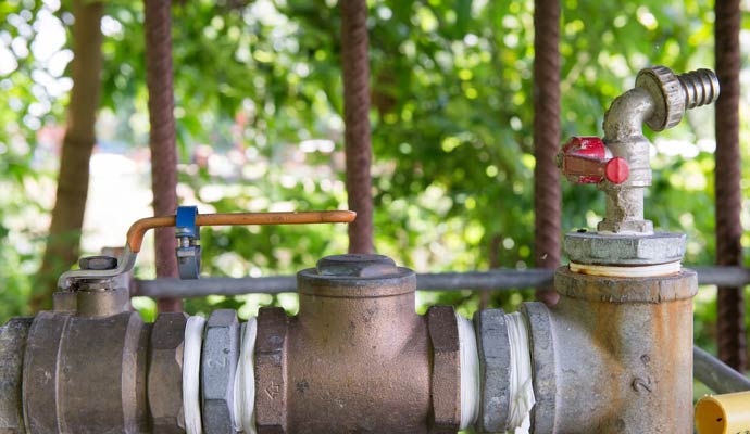 Brass double check backflow device with shut-off handle and valve